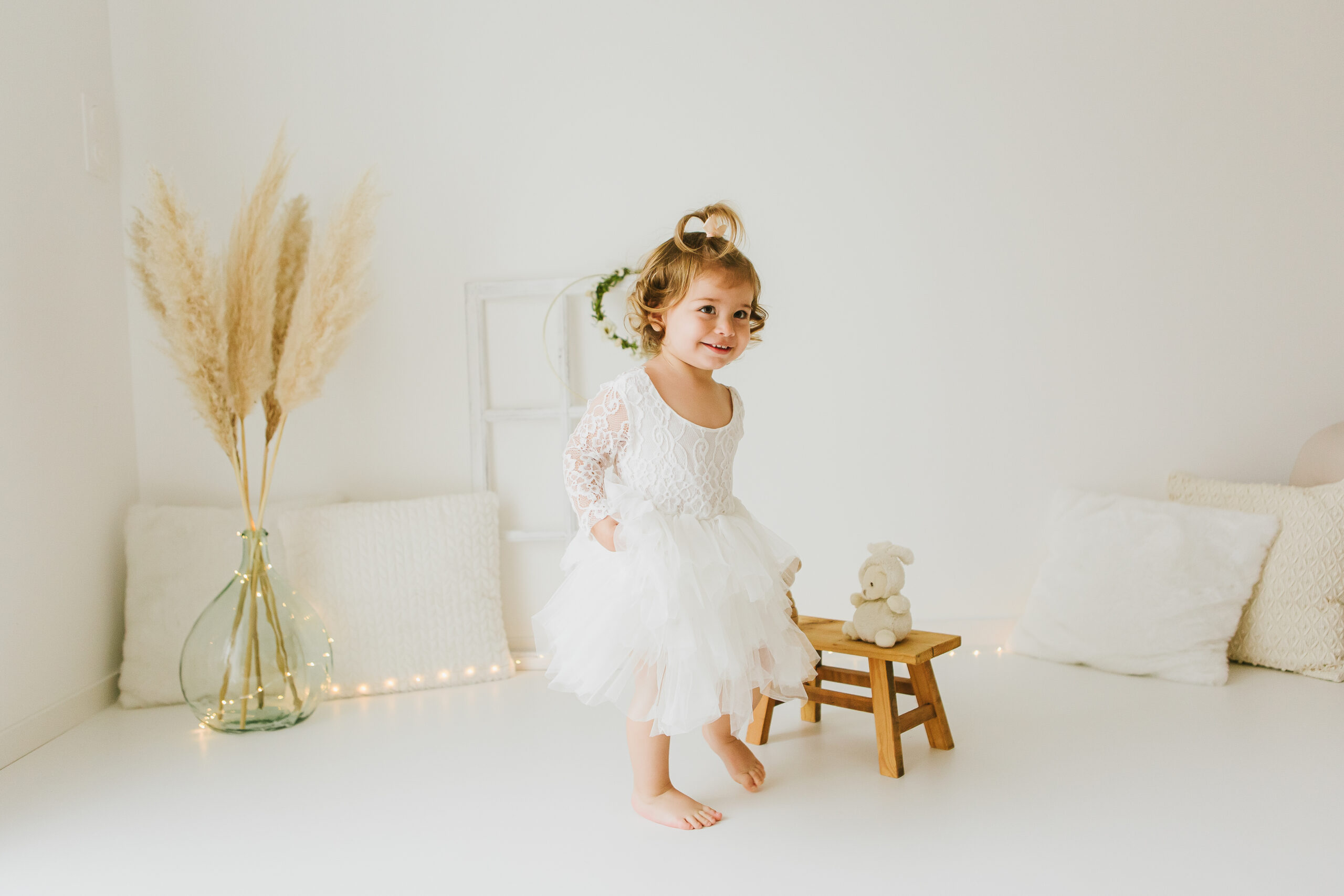 Bébé souriant pendant une séance photo pour ses 1 an 